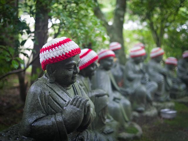 Monks in hats.